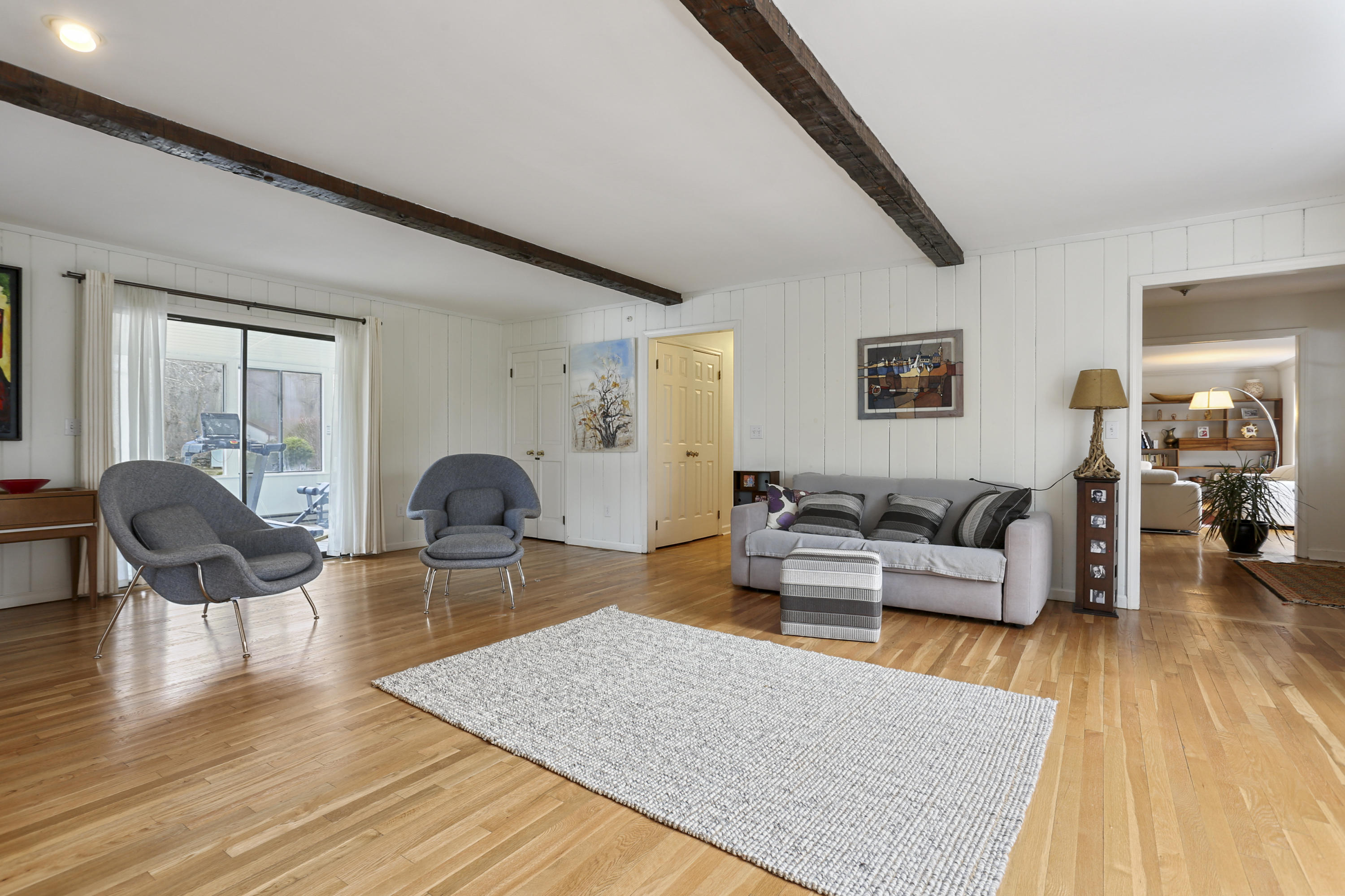 507 Brookside Road New Canaan, CT 06840 - Photo 19 of 36 a living room with furniture a couch and wooden floor
