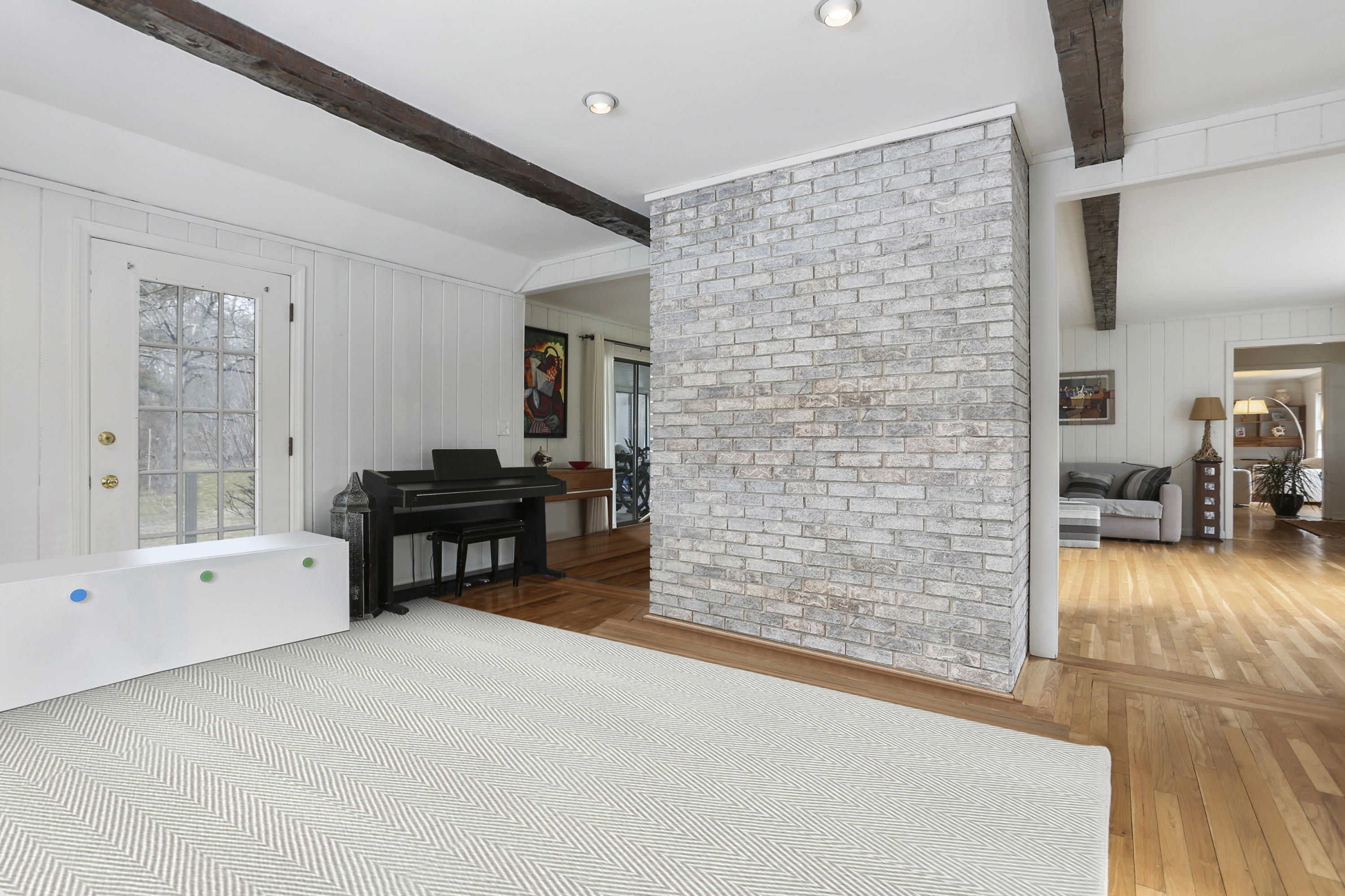 507 Brookside Road New Canaan, CT 06840 - Photo 20 of 36 a room with furniture and a floor to ceiling window