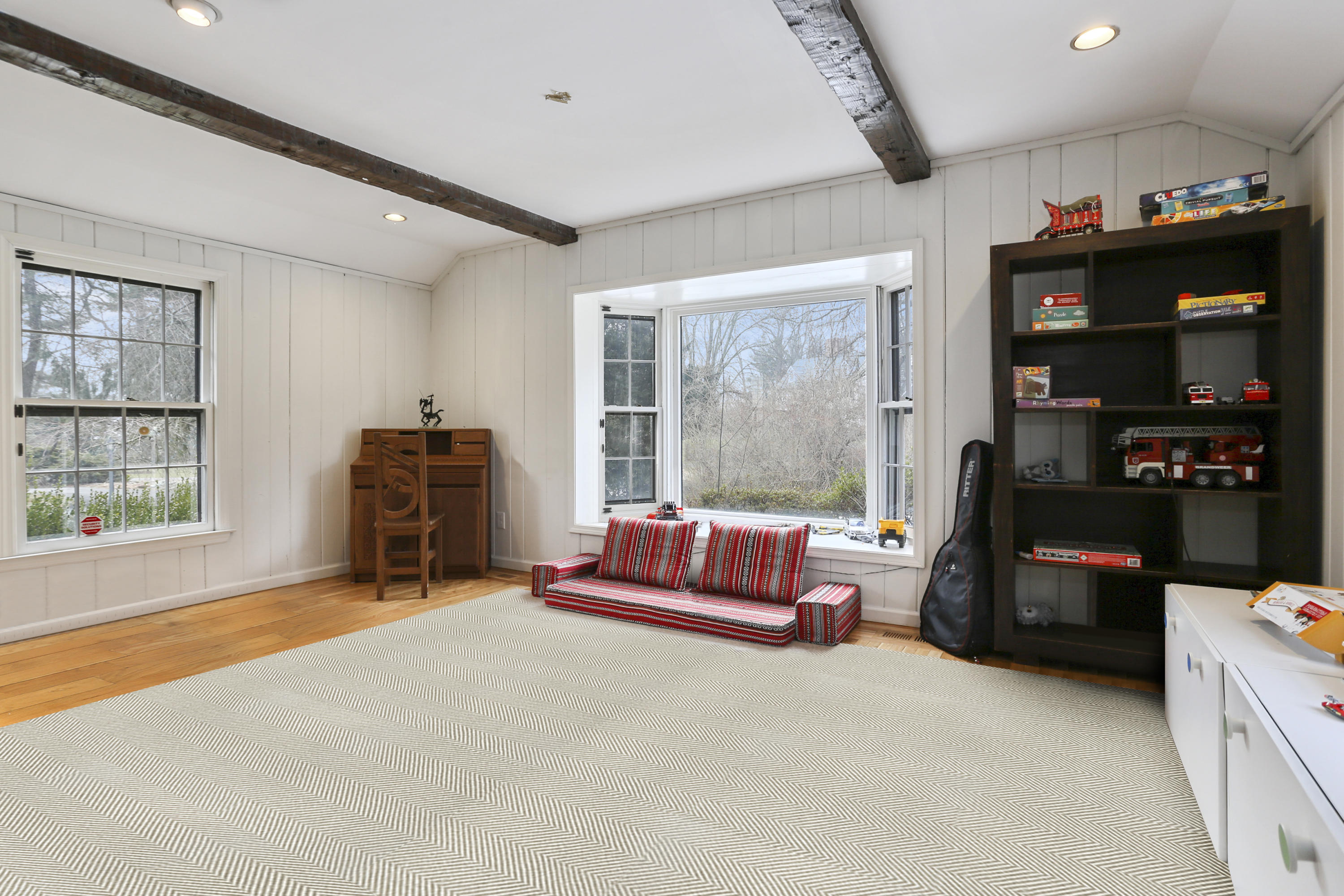 507 Brookside Road New Canaan, CT 06840 - Photo 21 of 36 a bed room with a bed and a large window