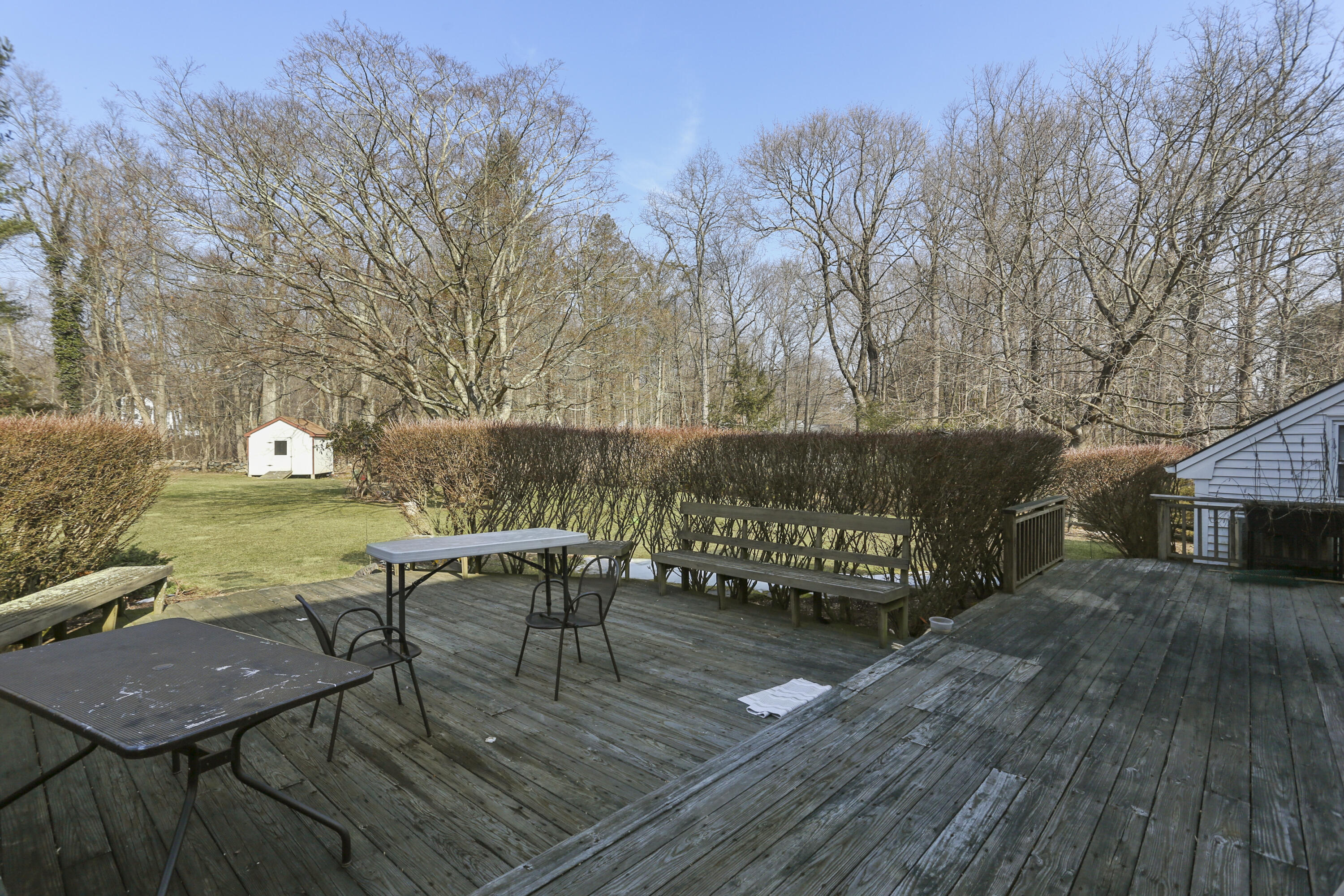 507 Brookside Road New Canaan, CT 06840 - Photo 29 of 36 a view of a chairs and table on the wooden floor