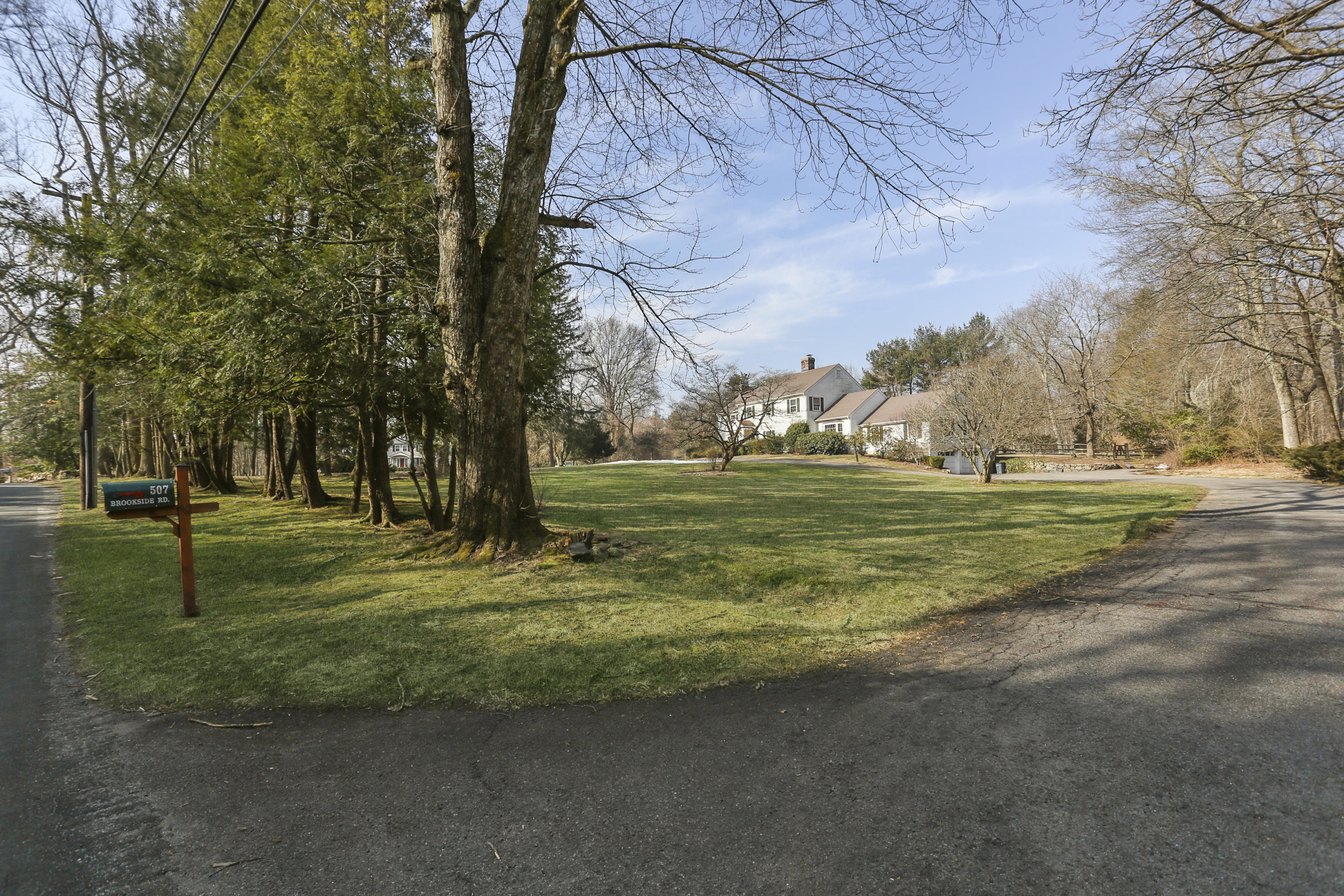 507 Brookside Road New Canaan, CT 06840 - Photo 4 of 36 a view of a park with large trees