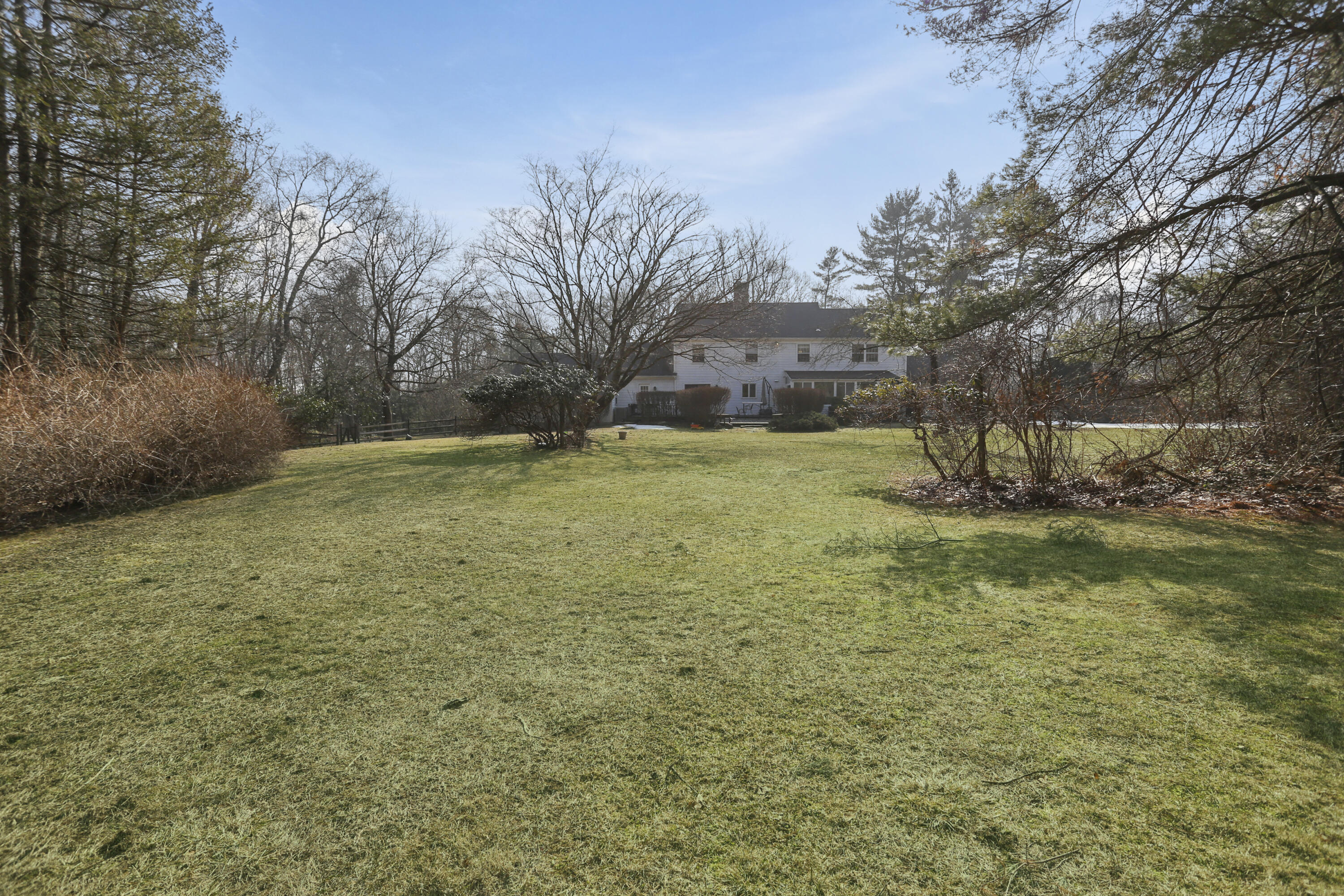 507 Brookside Road New Canaan, CT 06840 - Photo 33 of 36 a view of a yard with a fountain