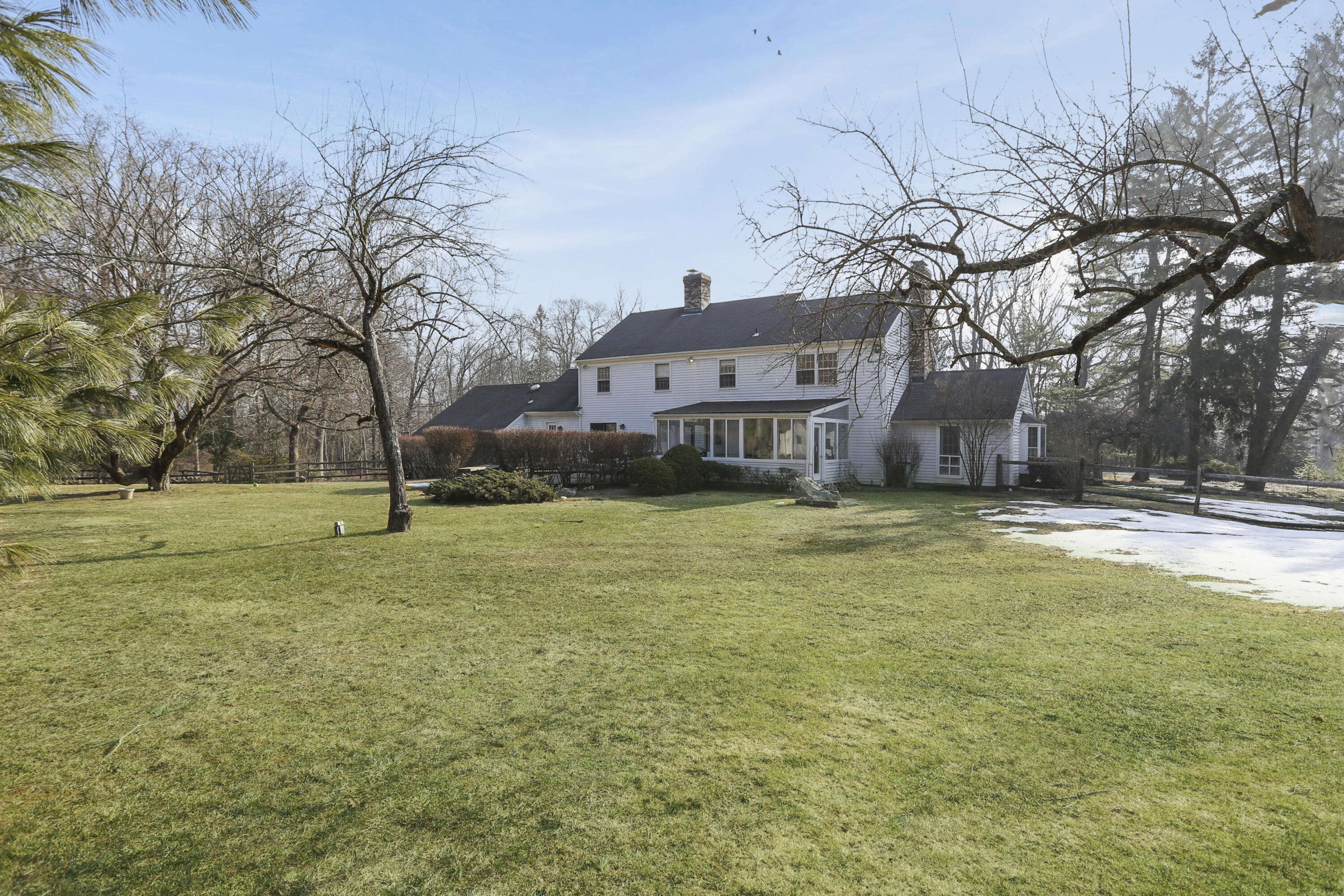 507 Brookside Road New Canaan, CT 06840 - Photo 34 of 36 a house view with swimming pool in front of it