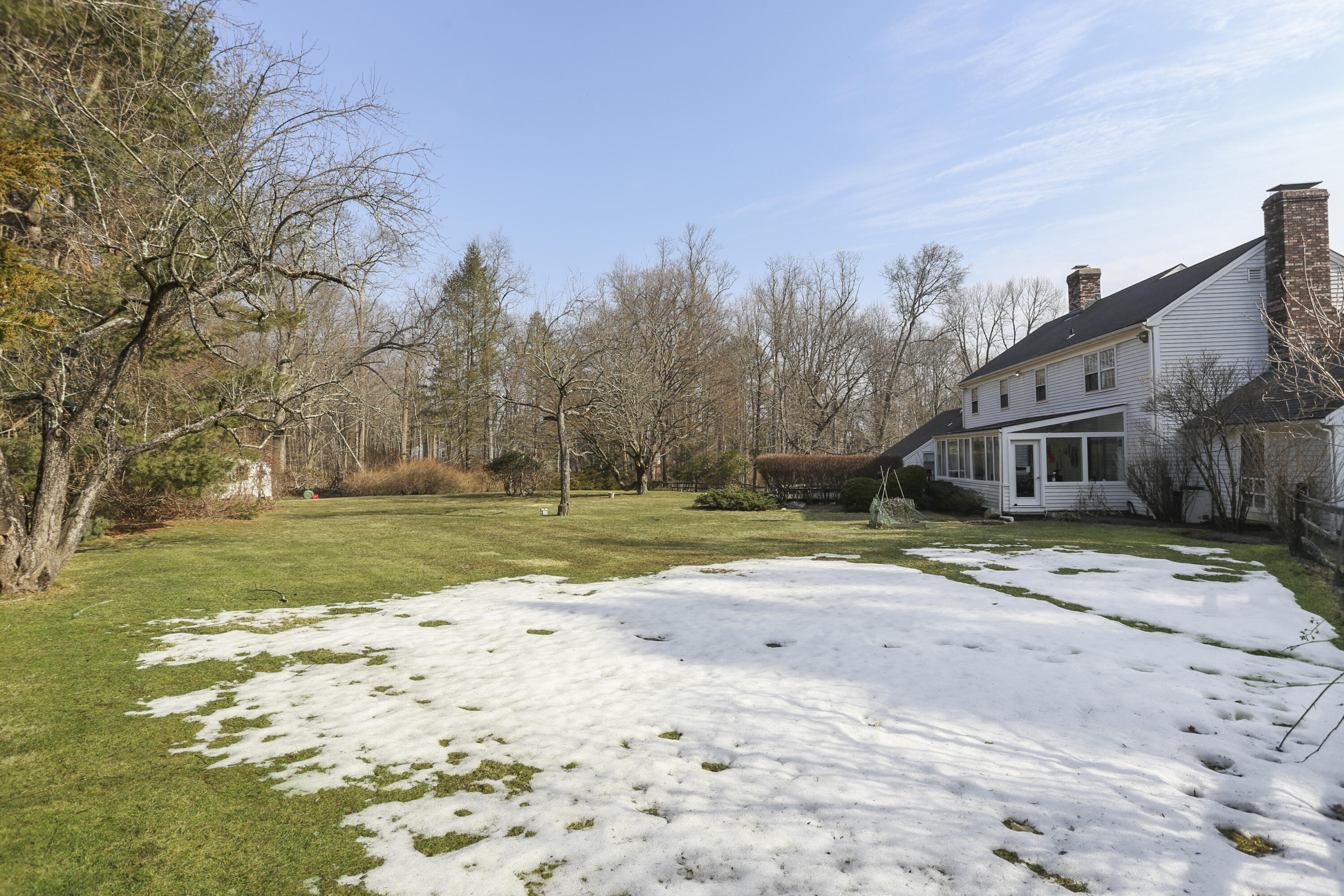 507 Brookside Road New Canaan, CT 06840 - Photo 35 of 36 a view of a house with a yard
