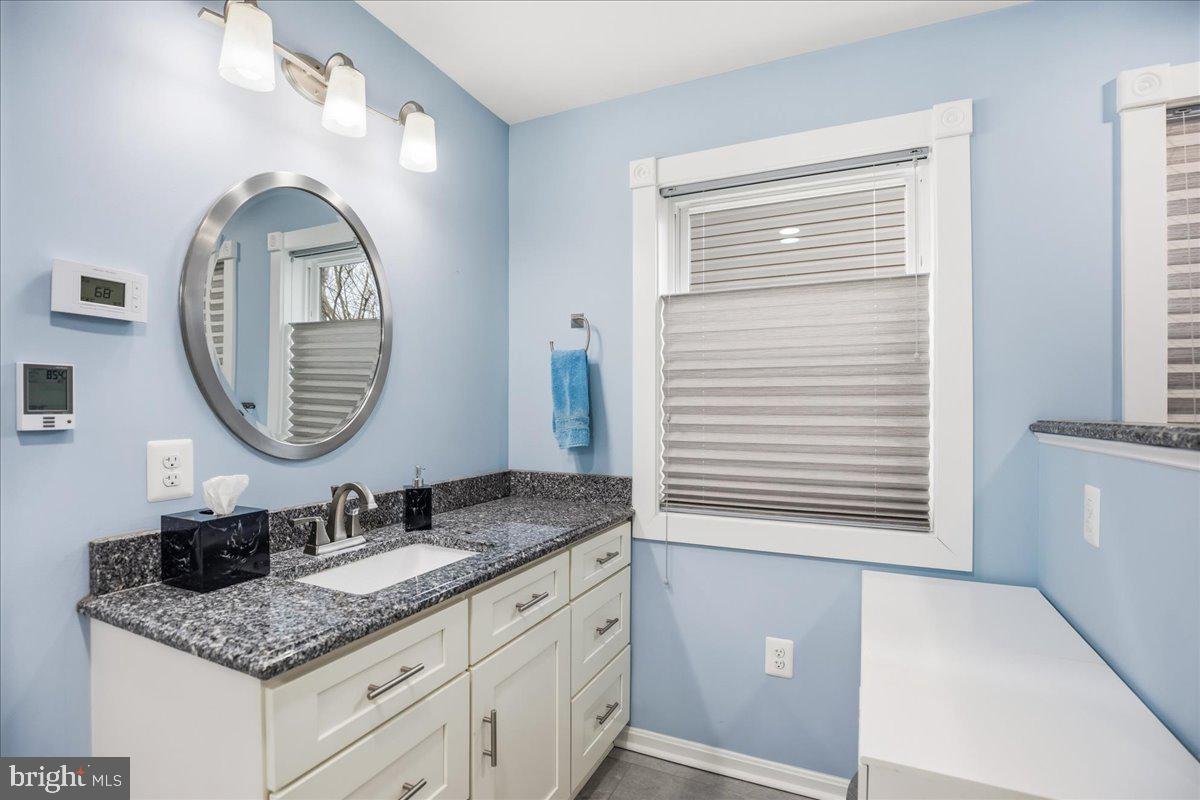 14382 Sedwick Avenue Solomons, MD 20688 - Photo 23 of 90 Second separate vanity, also granite counter