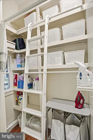 a view of a livingroom with furniture and a window