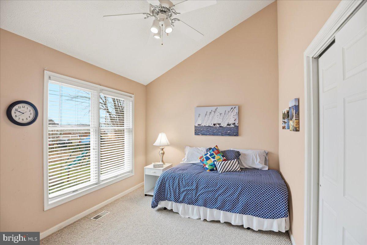 14382 Sedwick Avenue Solomons, MD 20688 - Photo 76 of 90 a bedroom with a bed and a window