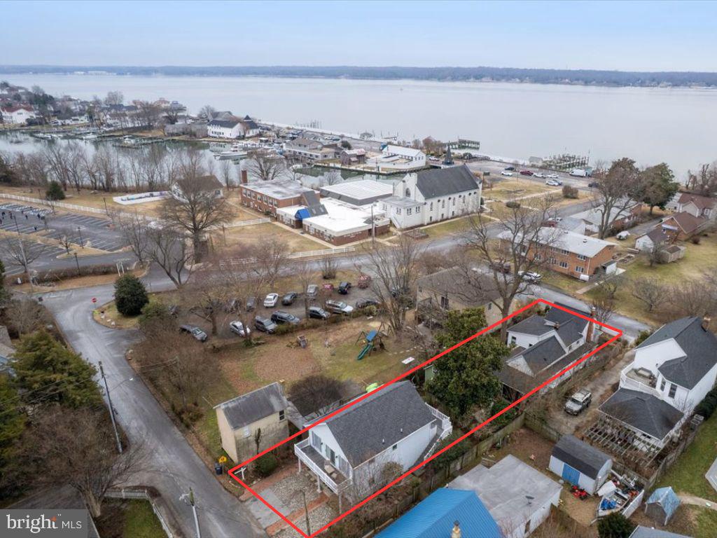 14382 Sedwick Avenue Solomons, MD 20688 - Photo 8 of 90 an aerial view of residential houses with outdoor space