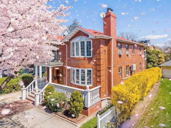 front view of a house with a street