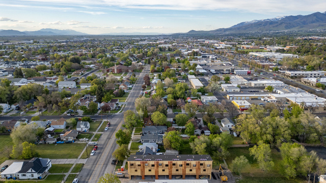 452 North 100 West, Unit 102 Logan, UT 84321 - Photo 19 of 34 Aerial overview of property's location featuring a mountainous background