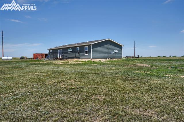 9990 North Log Road Calhan, CO 80808 - Photo 3 of 29 This 2015 modular homes sits on 40 acres and has a 15 stall horse barn