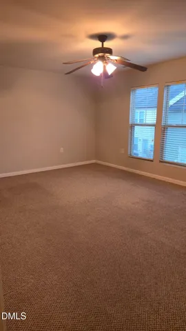 en view of an empty room with a window