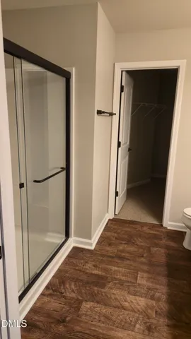 a view of entryway with wooden floor