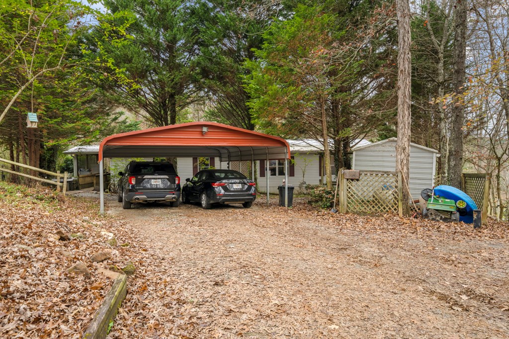 150 Curtis Switch Road Blue Ridge, GA 30513 - Photo 6 of 37 a view of house with outdoor seating