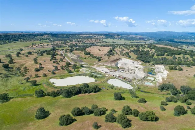 a view of a road with an ocean view