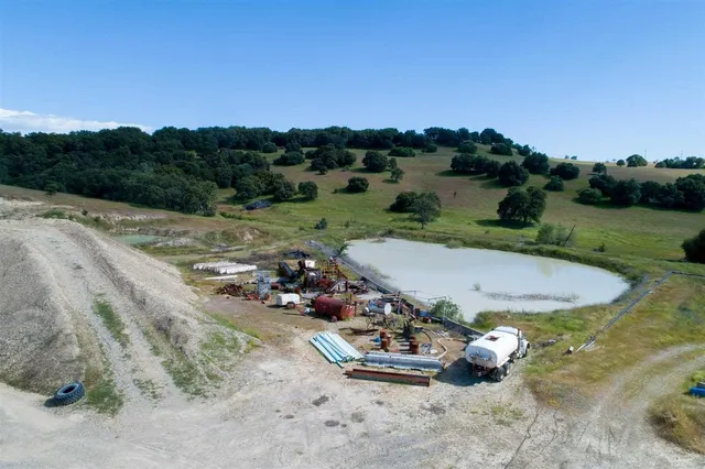 a view of a lake with a house