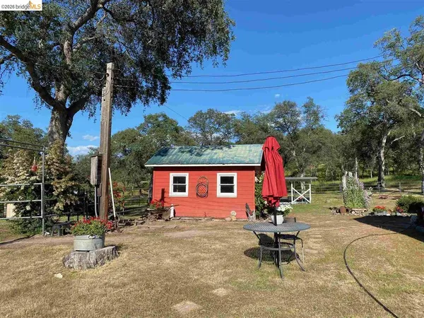 a view of house with outdoor space