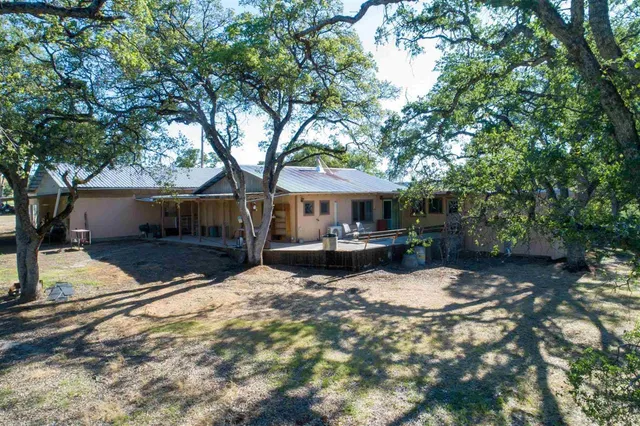 a view of a lake with a yard
