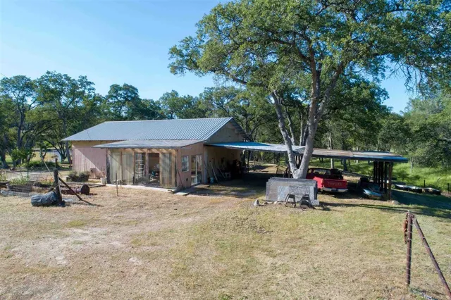 a view of a lake with a yard