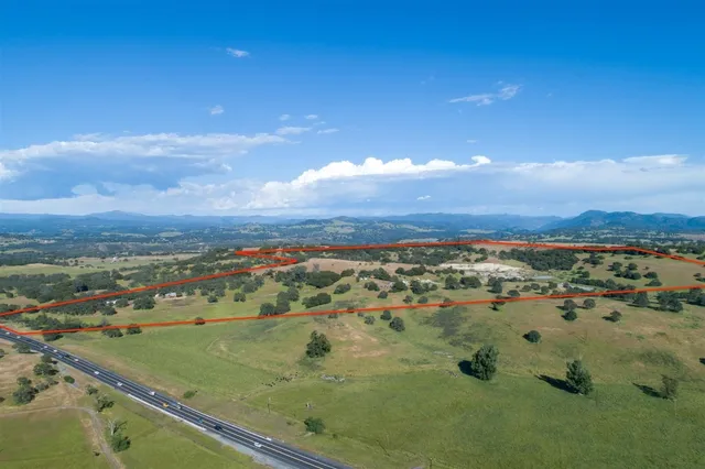 a fire hydrant in the middle of a field