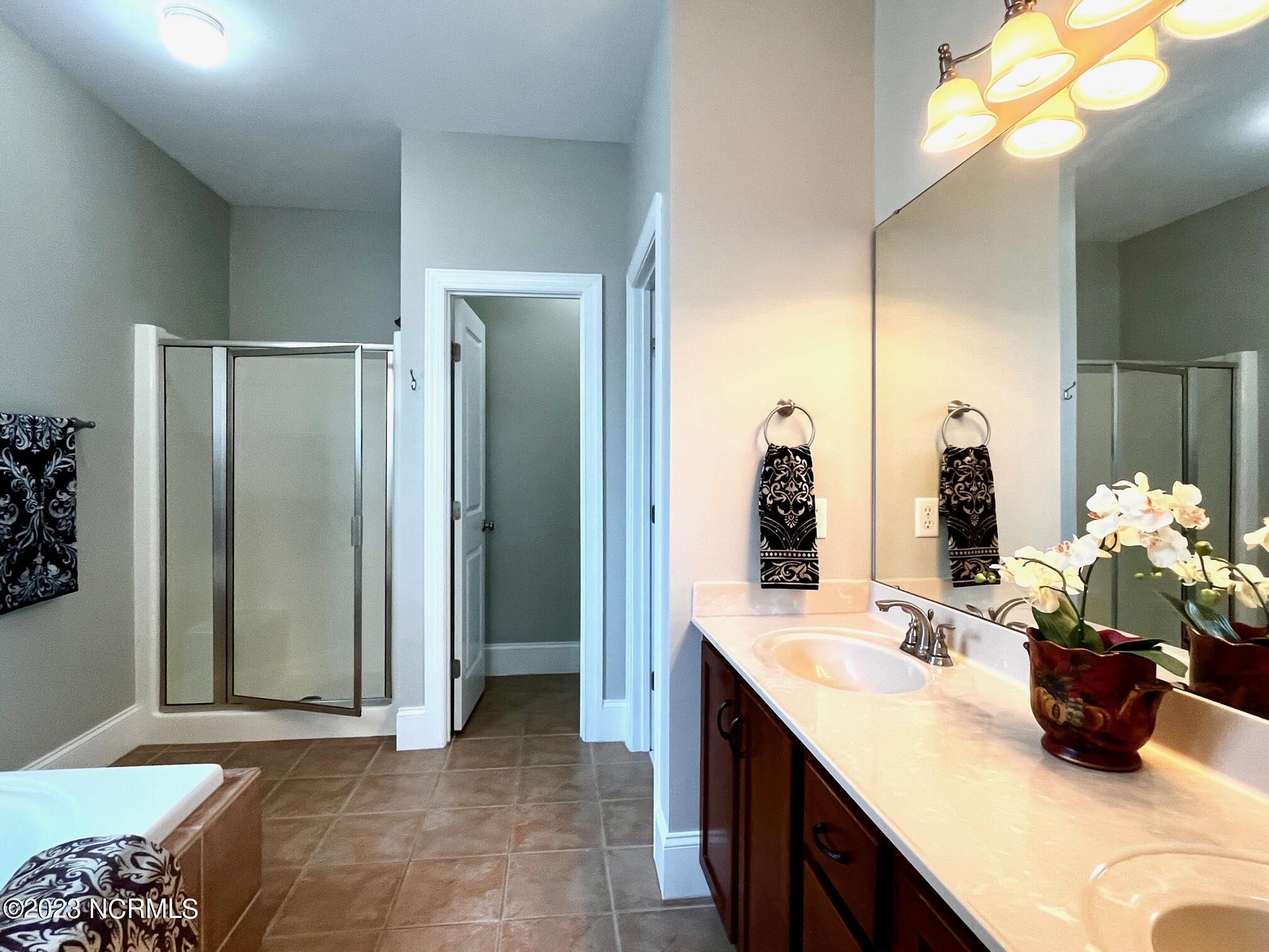 7176 Bonaventure Street Southwest Ocean Isle Beach, NC 28469 - Photo 22 of 30 62 Master Bath
