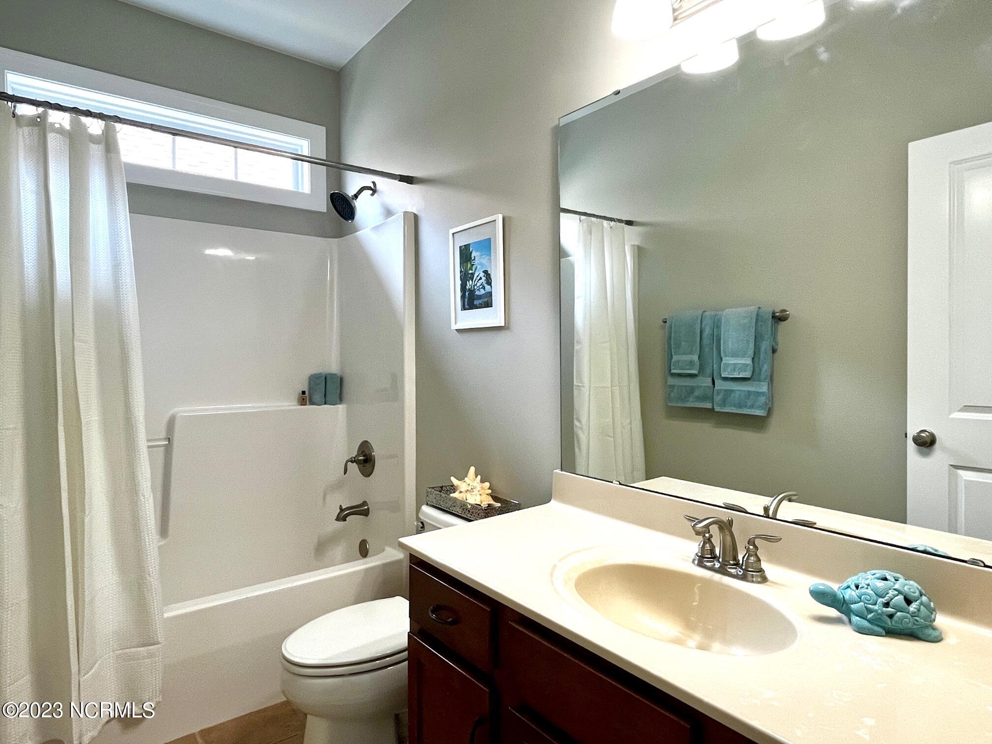 7176 Bonaventure Street Southwest Ocean Isle Beach, NC 28469 - Photo 23 of 30 63 Second Bath