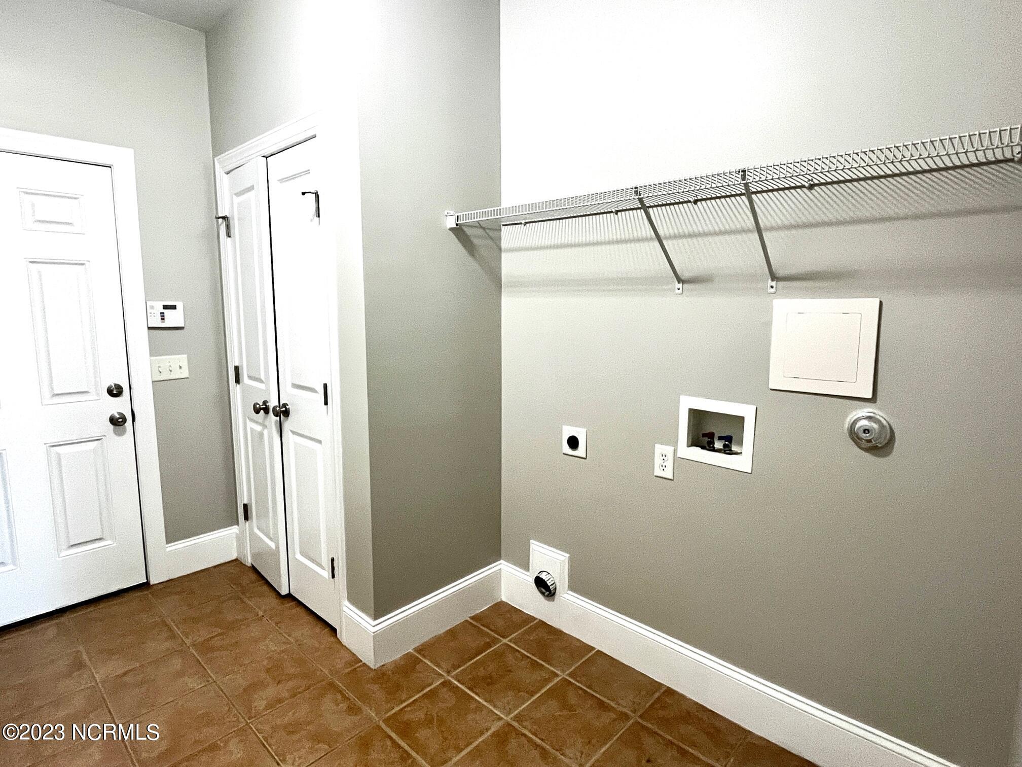 7176 Bonaventure Street Southwest Ocean Isle Beach, NC 28469 - Photo 24 of 30 71 Laundry