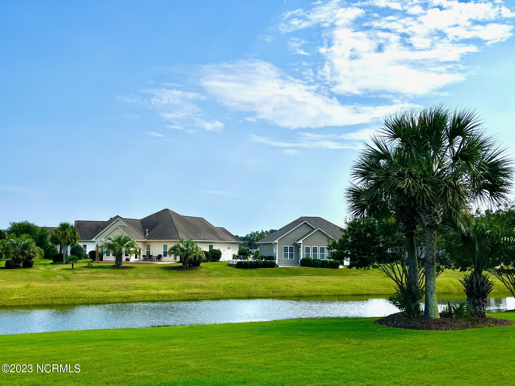 7176 Bonaventure Street Southwest Ocean Isle Beach, NC 28469 - Photo 28 of 30 82 Back Yard Pond