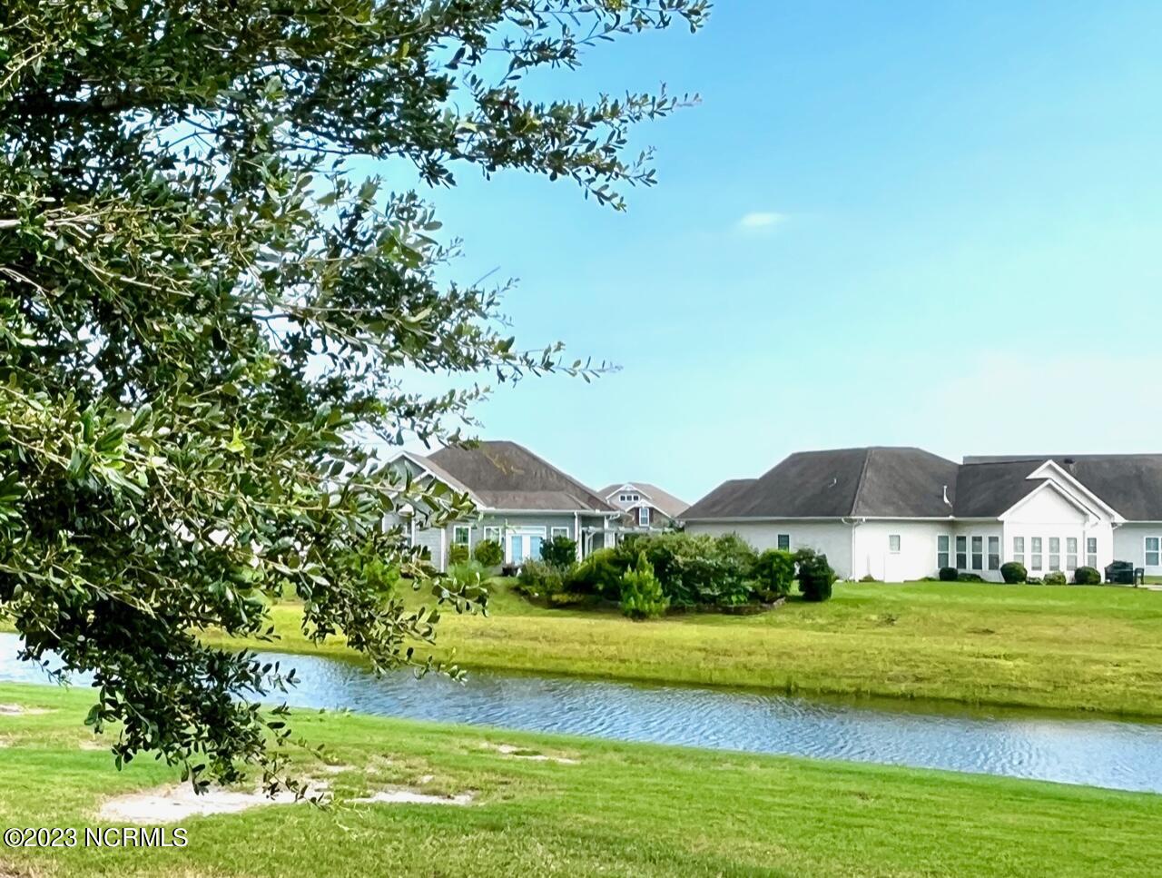 7176 Bonaventure Street Southwest Ocean Isle Beach, NC 28469 - Photo 29 of 30 83 Back Yard Pond
