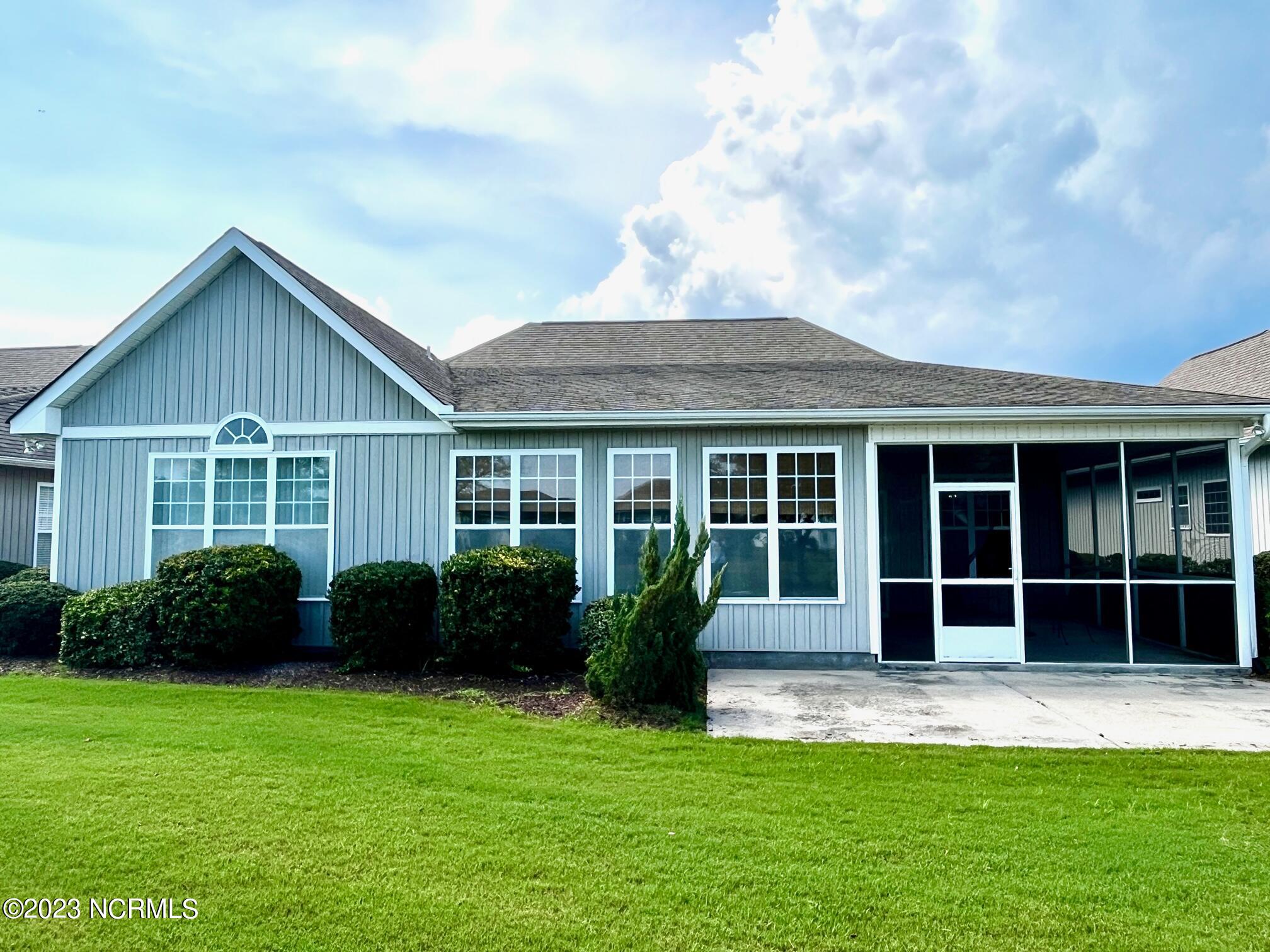 7176 Bonaventure Street Southwest Ocean Isle Beach, NC 28469 - Photo 30 of 30 90 Back House View