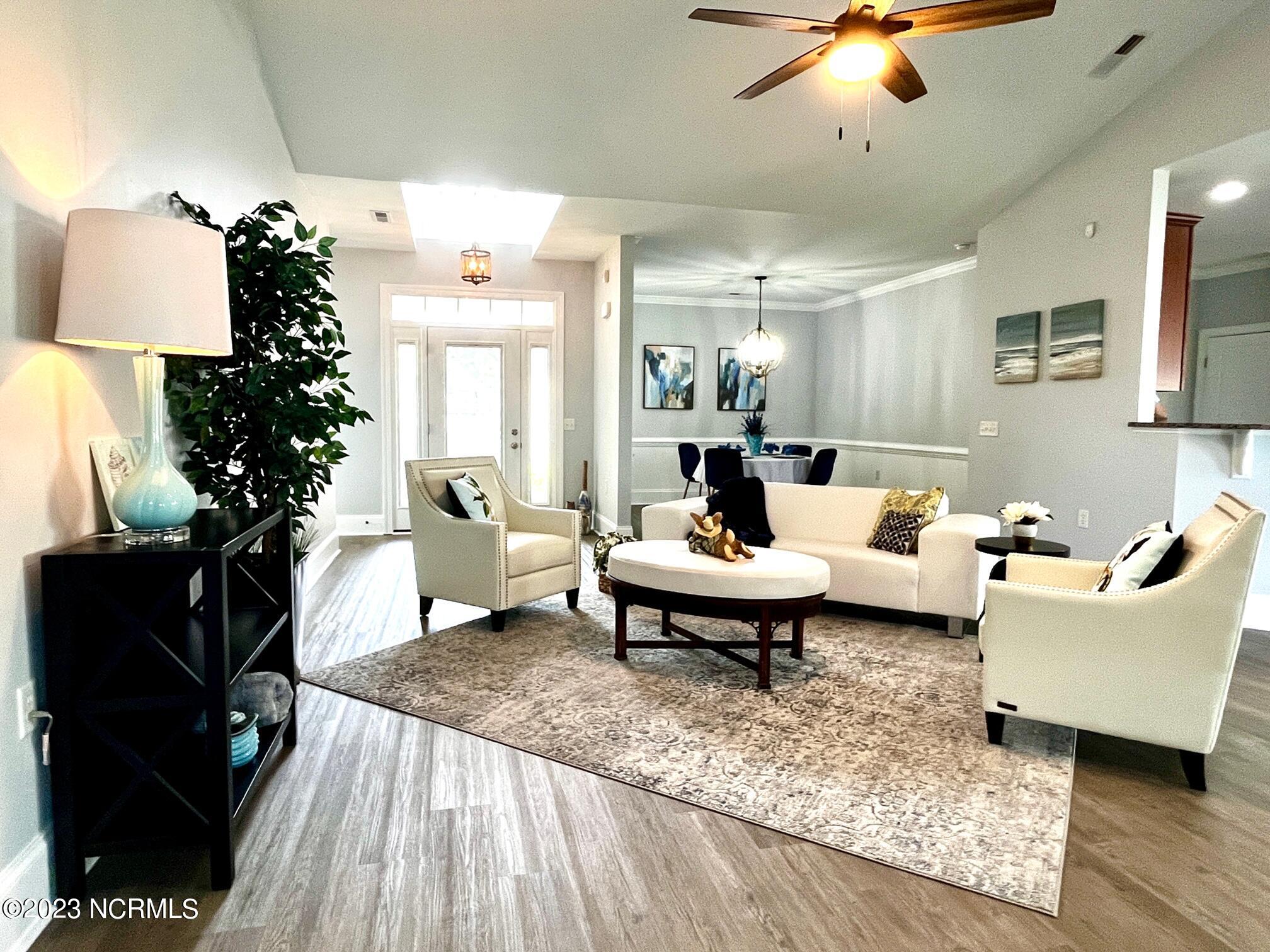 7176 Bonaventure Street Southwest Ocean Isle Beach, NC 28469 - Photo 4 of 30 22 Living Room