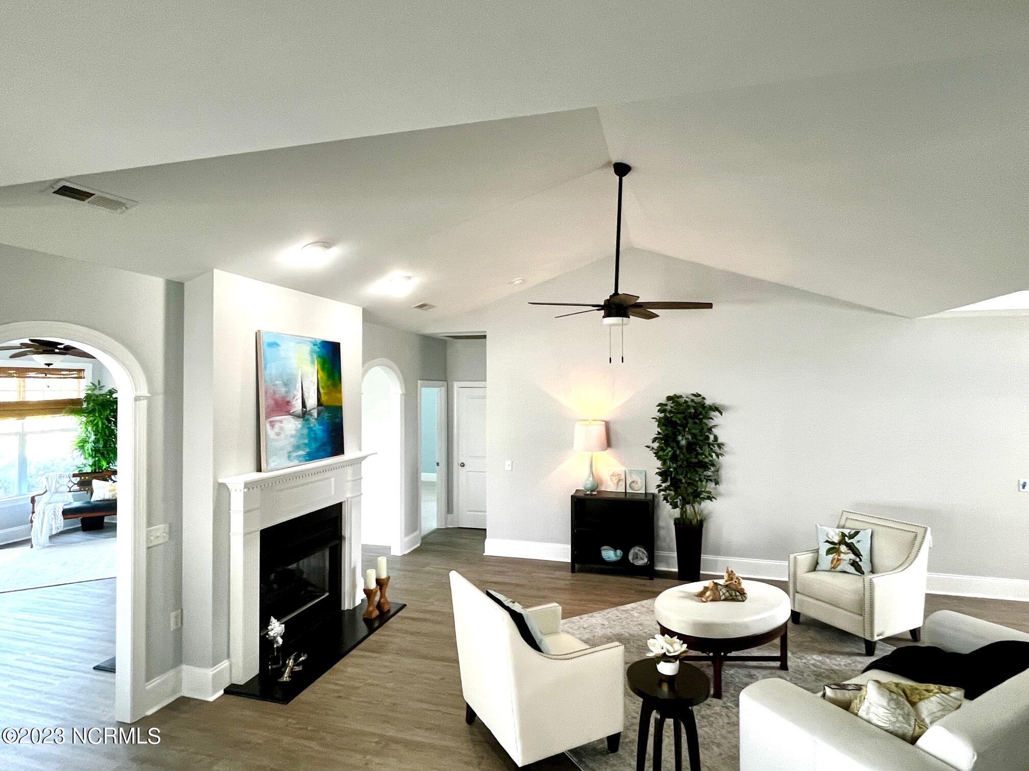 7176 Bonaventure Street Southwest Ocean Isle Beach, NC 28469 - Photo 6 of 30 24 Living Room