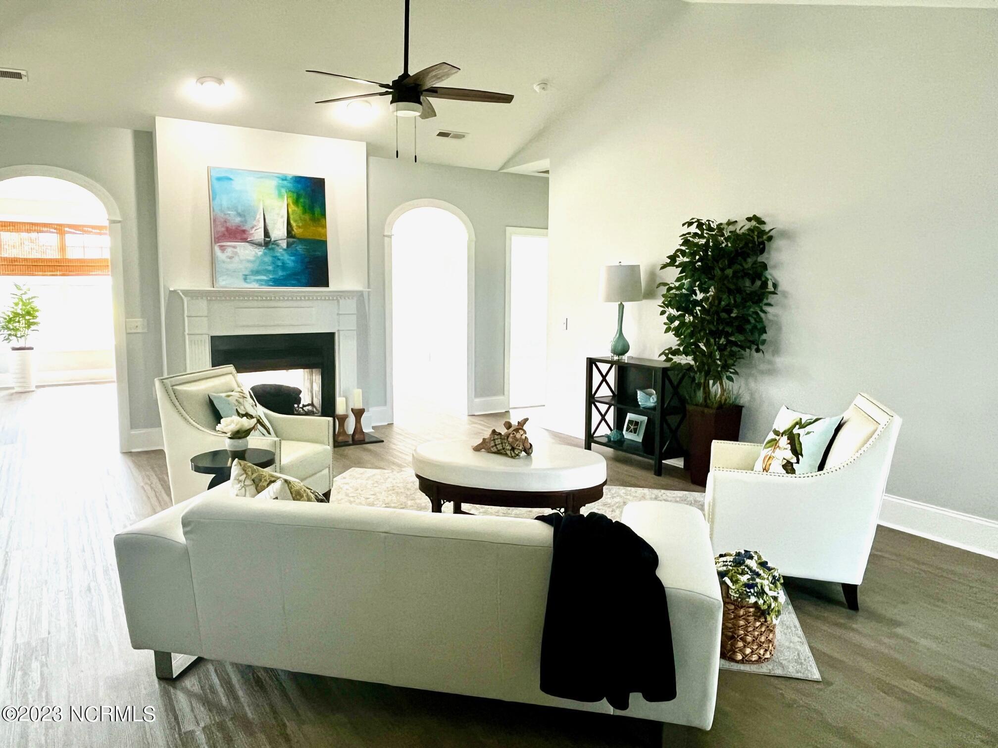 7176 Bonaventure Street Southwest Ocean Isle Beach, NC 28469 - Photo 7 of 30 25 Living Room