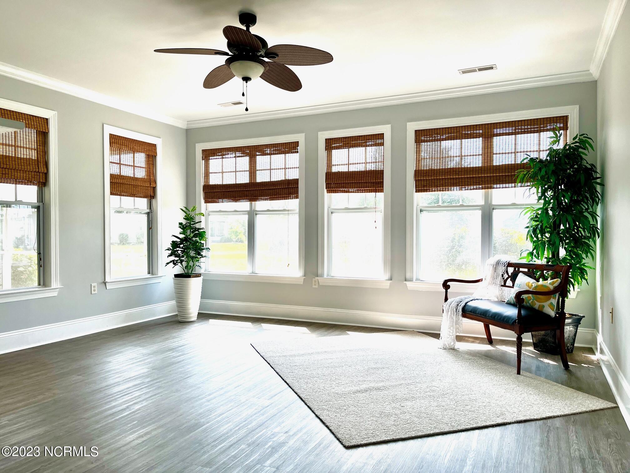 7176 Bonaventure Street Southwest Ocean Isle Beach, NC 28469 - Photo 8 of 30 32 Sunroom