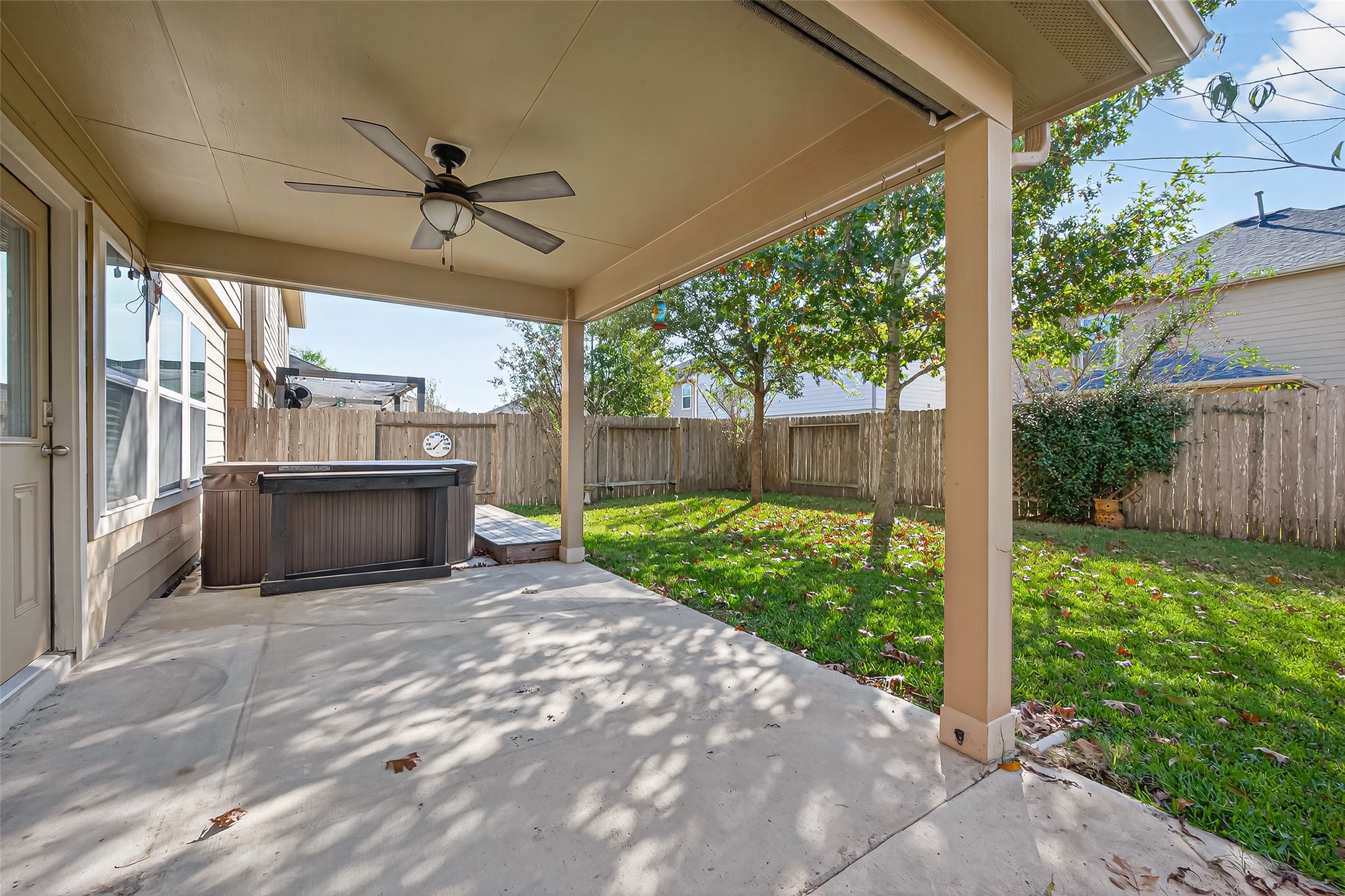 9940 Swallow Drive Conroe, TX 77385 - Photo 26 of 30 Gas stub on patio for grill. Custom sun shade and landscaping for privacy.