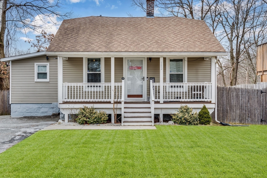 182 Wrentham Road Springfield, MA 01119 - Photo 2 of 25 a front view of a house with a yard