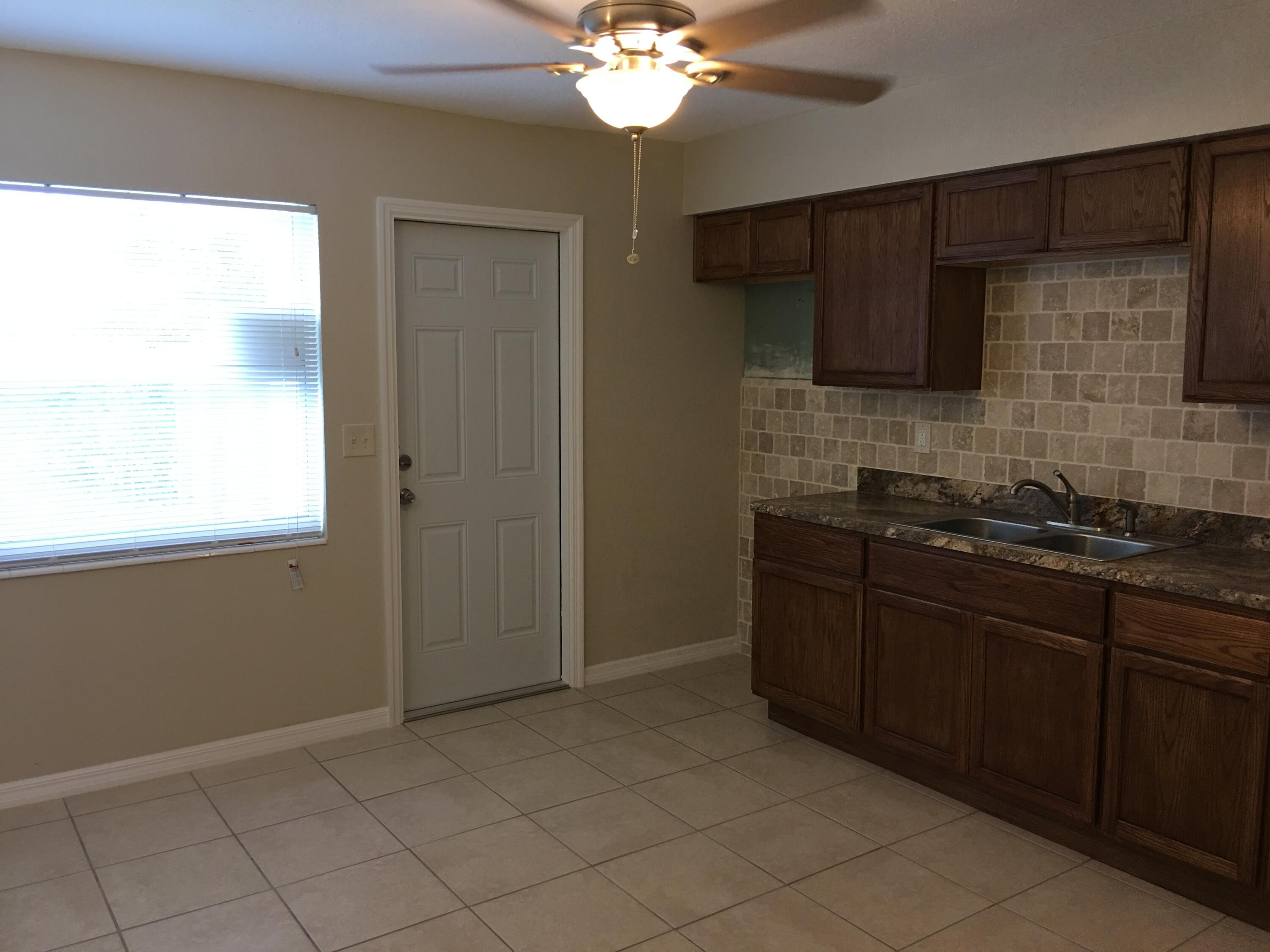 539 Silver Beach Road Lake Park, FL 33403 - Photo 4 of 23 541 kitchen