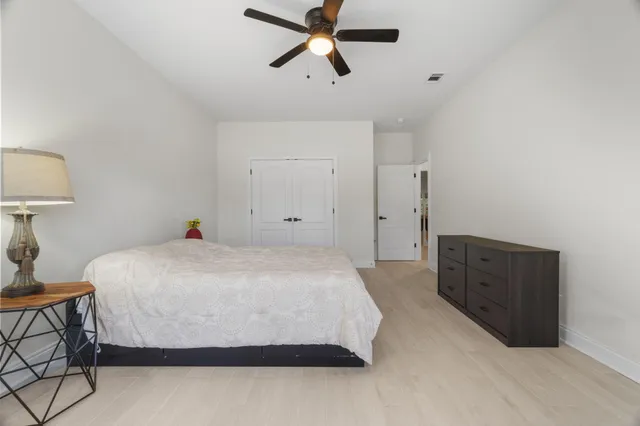 a view of a livingroom with furniture and a table