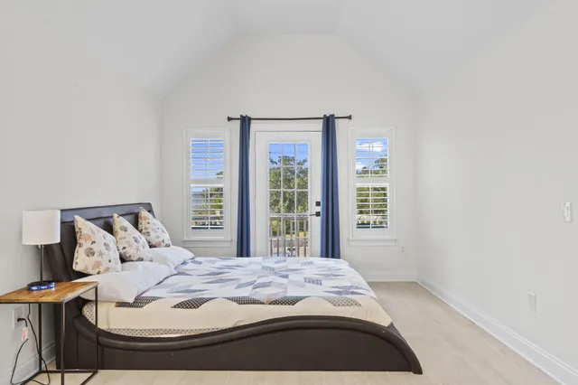 a view of a balcony with wooden floor
