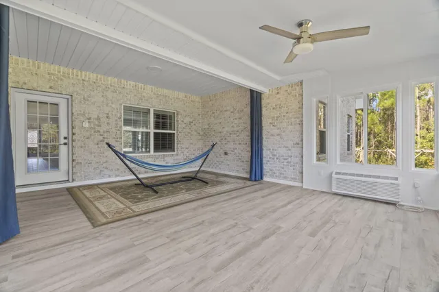a aerial view of a house with pool