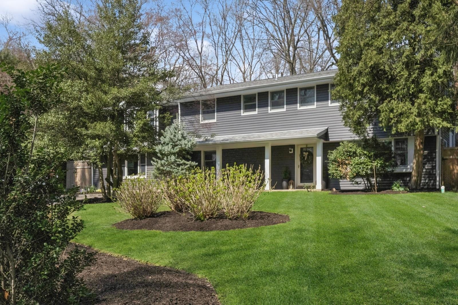 169 Southdown Road Huntington, NY 11743 - Photo 1 of 1 a front view of a house with a garden