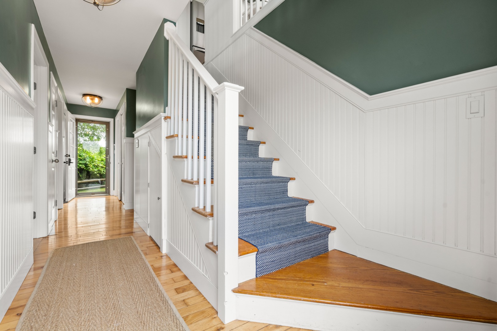 4 Berkley Street Nantucket, MA 02554 - Photo 32 of 47 a view of a hallway with wooden floor and entryway