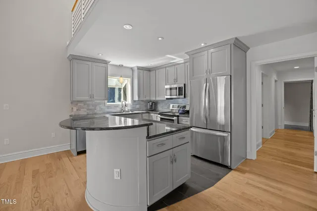 a view of balcony with wooden floor