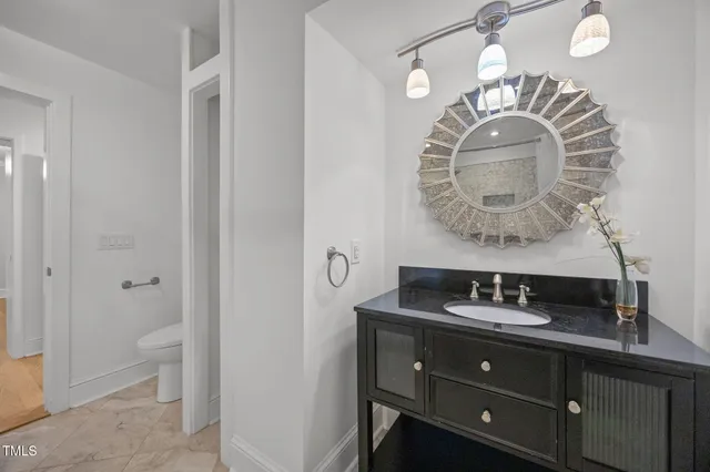 a view of a swimming pool with a table and chairs