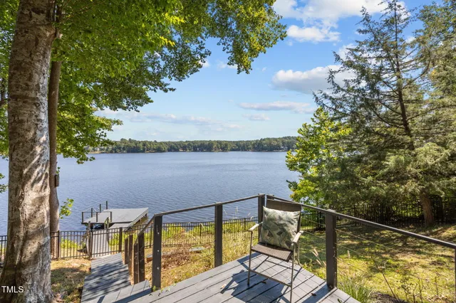 a view of a backyard with wooden floor