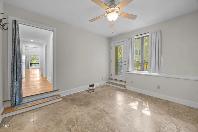 a view of a house with swimming pool and yard