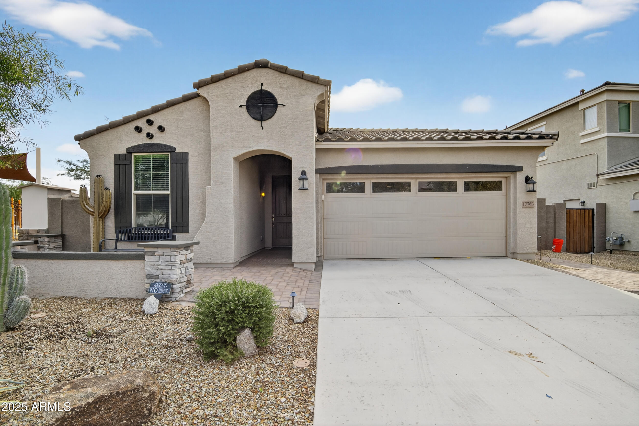 17763 West Granite View Drive Goodyear, AZ 85338 - Photo 2 of 67 a front view of a house with entryway