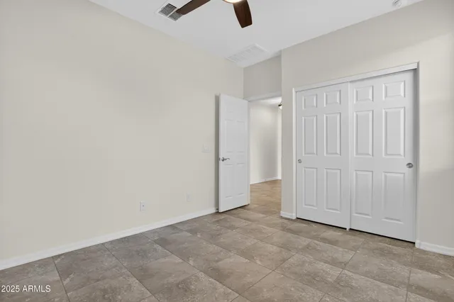 a utility room with sink dryer and washer