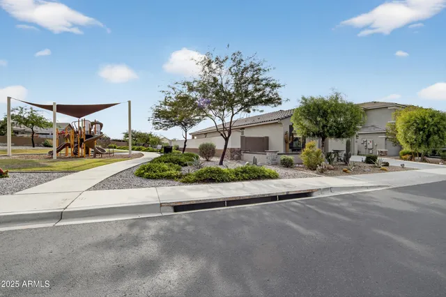 a view of swimming pool with outdoor seating and city view