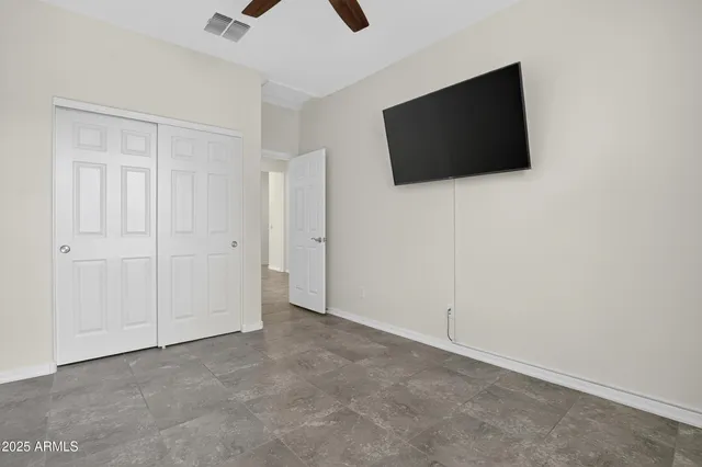 a view of a dinning table and chairs in the patio
